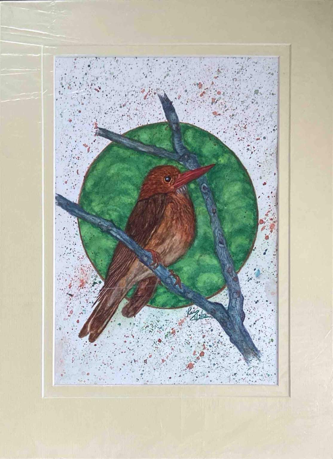 Bird perched in emerald.