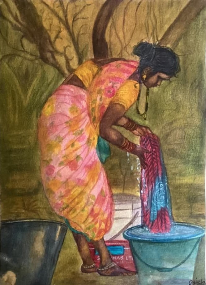 Woman of rural India busy in washing clothes.
